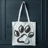 Digital representation of pet paw impressions created with precision lines and scalable design.