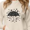 Rainy day umbrella design with heart motifs, ideal for crafting and DIY projects.