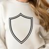 A decorative line art shield design with intricate details. A simple line drawing of a shield with decorative details.