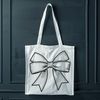 Colorful Ribbon Bow Decoration A colorful bow made from ribbons and loops, perfect for decorating gifts or presents.
