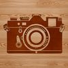 A digital camera icon featuring a simple and modern design.