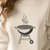 Summer Grilling Essentials Grilled meats on a BBQ grill with vegetables and condiments.