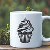 Beautiful Bakery Clip Art A digital graphic of a decorated cupcake in vector format.