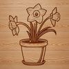 Spring Florals SVG Graphic A green and white daffodil plant growing in a flower pot, surrounded by natural foliage.