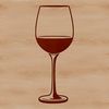A glass filled with red wine on a table, ideal for vector art designs.