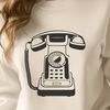 A detailed illustration of a telephone with various features highlighted.