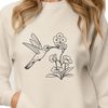 Floral Bird Design SVG Icon A colorful illustration of a hummingbird perched on a floral branch, ideal for crafts and designs.