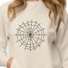A delicate, hand-drawn spider web illustration created as a vector graphic.