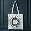 A simple vector graphic design featuring a bright yellow sun icon.