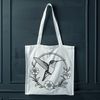 Illustrated hummingbird with floral accents, suitable for digital designs and crafts.
