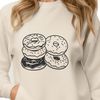 Rounded Delight Clip Art A round, sweet dessert with a ring-shaped design, ideal for clip art and vector graphics.