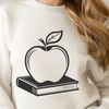Teacher's Desk Decor with Open Apple Book Vector illustration of a teacher's desk with an open Apple Book, ideal for educational settings and classroom decorations.