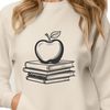 Red Apple Cover Art An open book with a shiny red apple symbol on the cover, designed as a vector graphic.