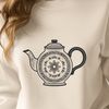 Beautiful Free Printable Teapot Design A stylized illustration of a teapot with a handle and spout, suitable for printing and cutting out using a cutting machine.