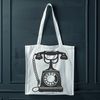 Free Vector Telephone Illustration A minimalist vector illustration of a classic telephone with sleek lines.