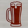 Glass of Cold Beer with Foam A glass containing beer with frothy head.