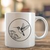 Free Floral Bird SVG Artwork A detailed illustration of a hummingbird perched on a floral stem.