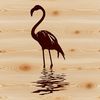 A brightly colored bird with long legs and distinctive pink plumage, commonly found in tropical wetlands.