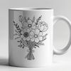 Fresh Floral Arrangement in a Decorative Vase A bouquet of flowers arranged in a decorative vase.