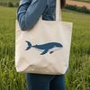 Stylized Whale SVG Design A free SVG design featuring a stylized whale, perfect for cutting with a Cricut or laser engraving.