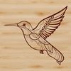 A small, colorful bird in mid-flight, its wings beating rapidly.