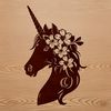 Enchanted Forest Unicorn A mythical creature with a horse-like head and a single horn on its forehead, surrounded by floral elements.