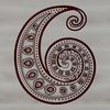 A geometric ornate pattern featuring a stylized paisley shape.