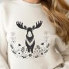 Wild Forest Icon A large, antlered mammal roaming through a forest landscape.