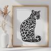 Exotic Wild Cat Silhouette A sitting big cat with spotted fur, native to the Americas.