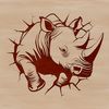 Wild Safari Animal Silhouette A large, grayish-brown rhinoceros standing in a natural environment.