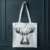 A large, brown wild animal with antlers and a distinctive hump on its shoulders.