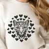 A close-up illustration of a wild ocelot's head, featuring heart motifs.