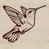 A colorful hummingbird in mid-air, its wings beating rapidly as it hovers near flowers.