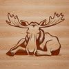 A wild North American animal, the moose is depicted in a relaxed sleeping position.