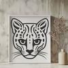 Wild Ocelot SVG Design An SVG design featuring a wild ocelot's head in detail, suitable for various digital applications.