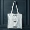 Elegant Wine Design SVG File A stylized illustration of a glass of wine with an empty bottle in the background.