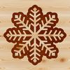 A delicate, symmetrical snowflake with intricate details and six sides, perfect for winter or Christmas-themed designs.