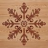 Ornate Snowflake Illustration A delicate ornate snowflake design made from intricately connected lines and shapes.