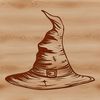 Illustration of a witch's hat with a broomstick and cauldron in the background, depicting witchcraft magic.