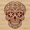 A detailed illustration of a witch's head with ornate Gothic-style lettering and a skull motif.