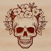A gothic illustration featuring ornate floral patterns and a skull symbolizing witchcraft.