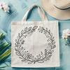 A detailed floral wreath design made up of intricate patterns and shapes.