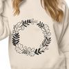 Hand-Drawn Floral Wreath Template A hand-drawn floral wreath design made from vector shapes.